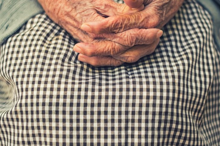 person's hand in shallow focus