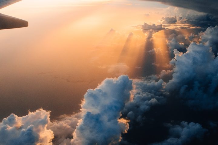 airplane on sky during golden hour