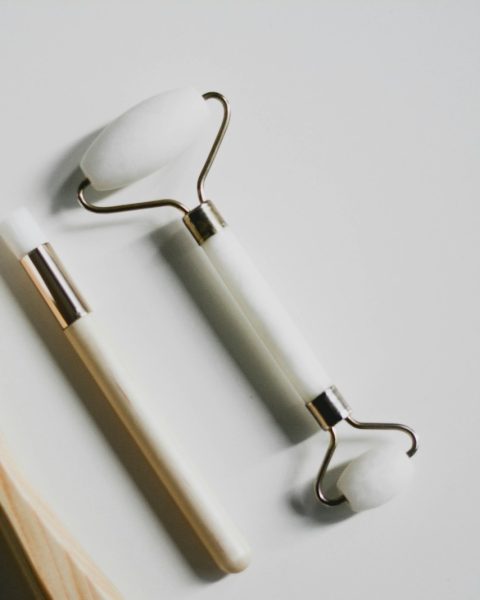 silver spoon and fork on white surface