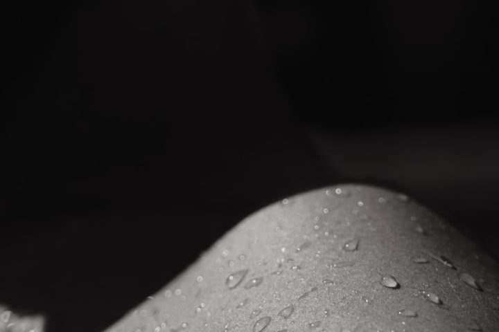 water droplets on gray surface