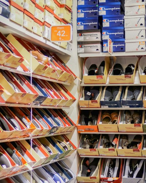 assorted pairs of shoes on boxes